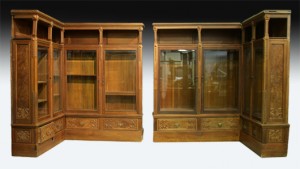 Two corner pieces of the original walnut library executed by Gotlieb Volmer, circa 1887, for a Philadelphia mansion. Kamelot Auctions image